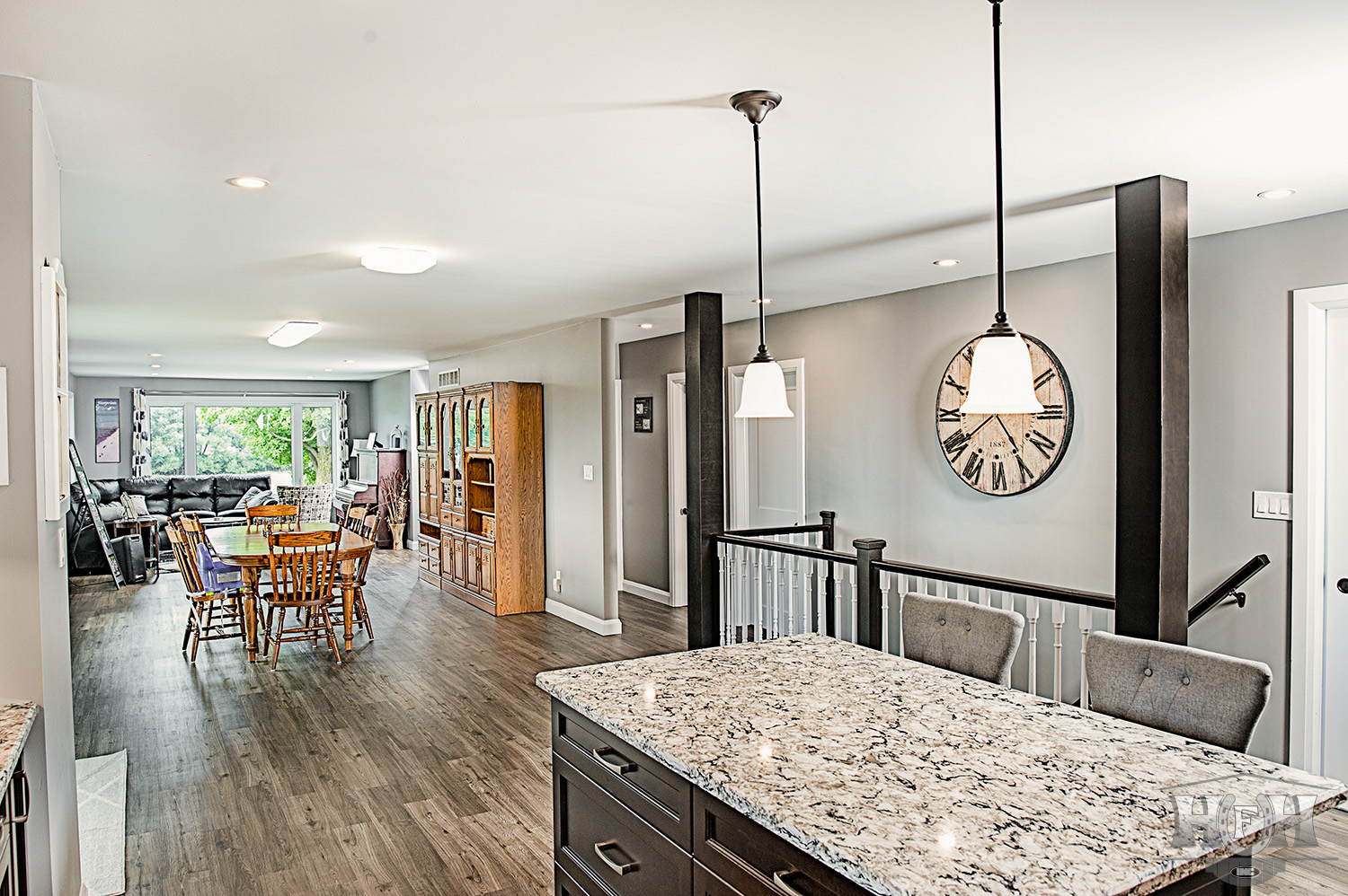 kitchen island with stairs to basement